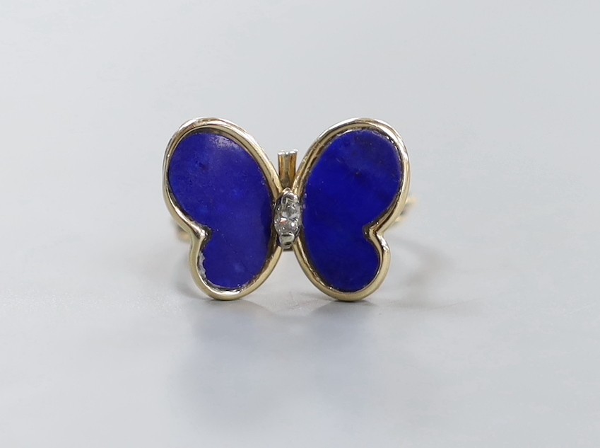 A yellow metal, lapis lazuli and diamond set 'butterfly' ring, size I, gross weight 2.6 grams.